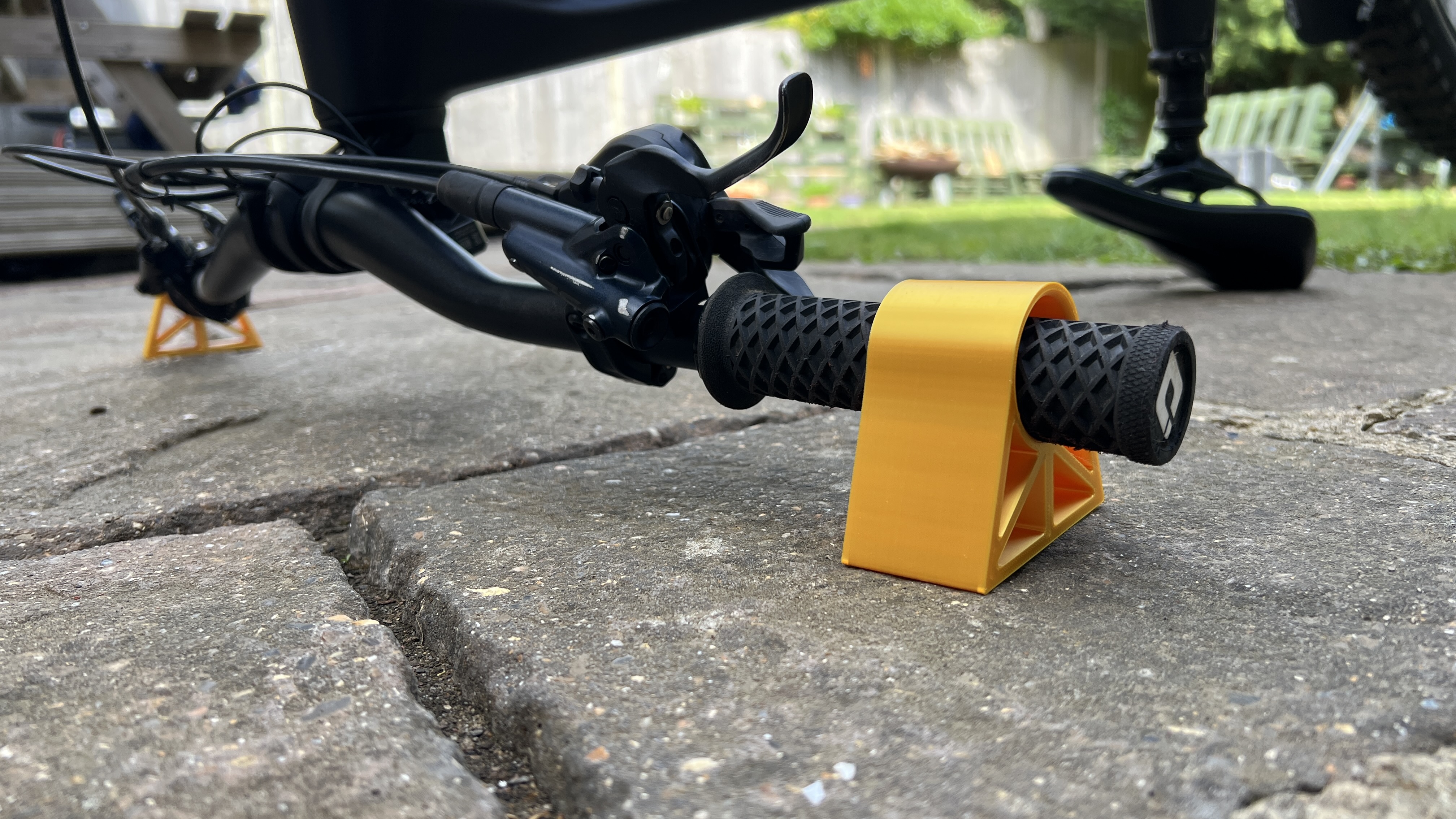 Bar Guards lifting a mountain bike clear of the ground