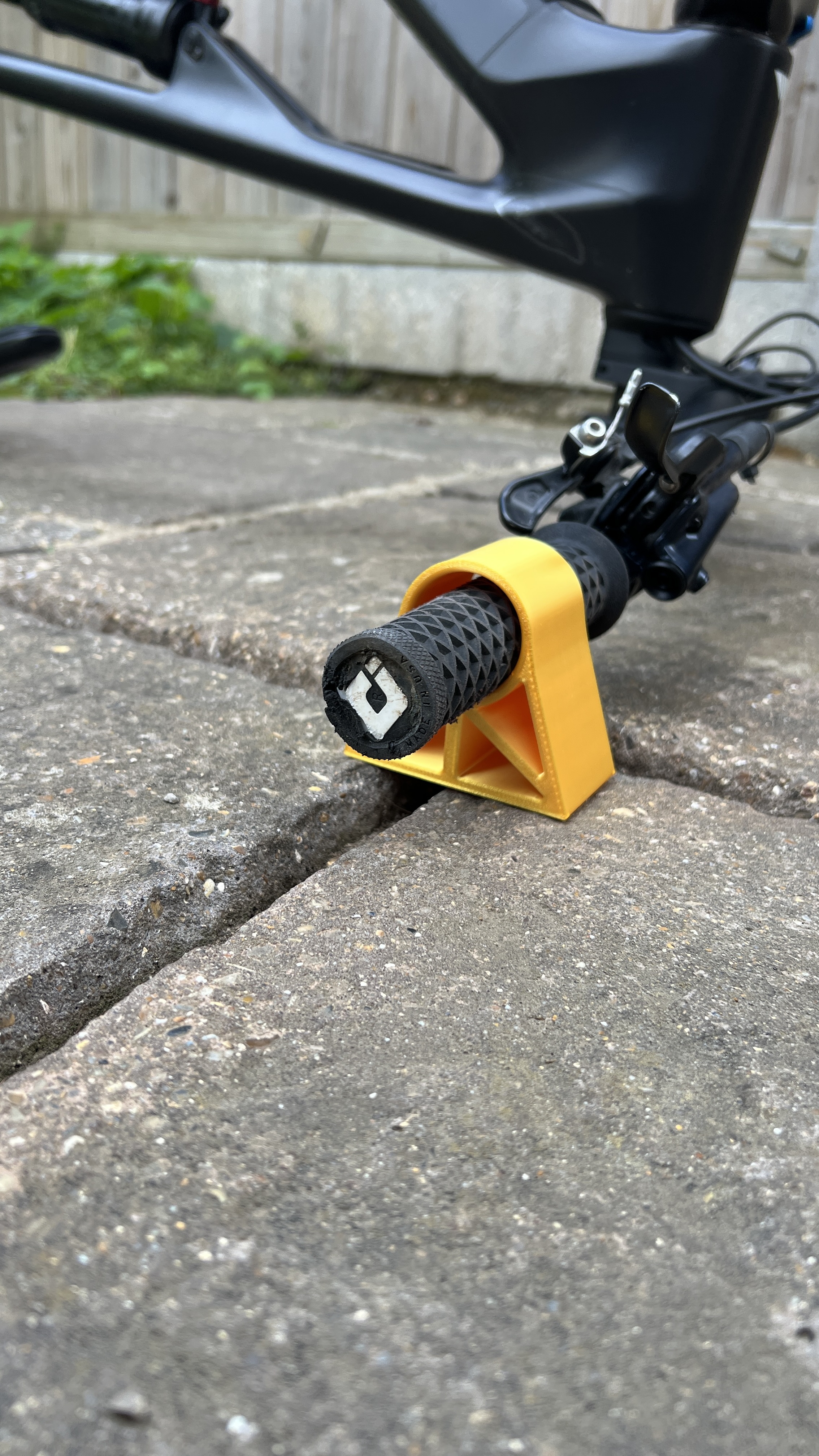 Bar Guards orange handlebar guard close up showing ODI grip fit